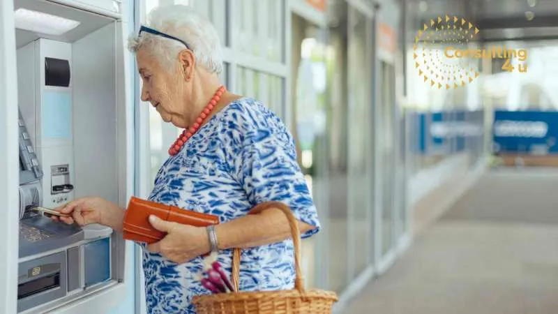 Καταμέτρηση Ενσήμων: Με λίγα βήματα μάθετε τι δικαιούστε Ηλικιωμένη κυρία που παραλαμβάνει τα μετρητά έπειτα από την πληρωμή της σύνταξής της